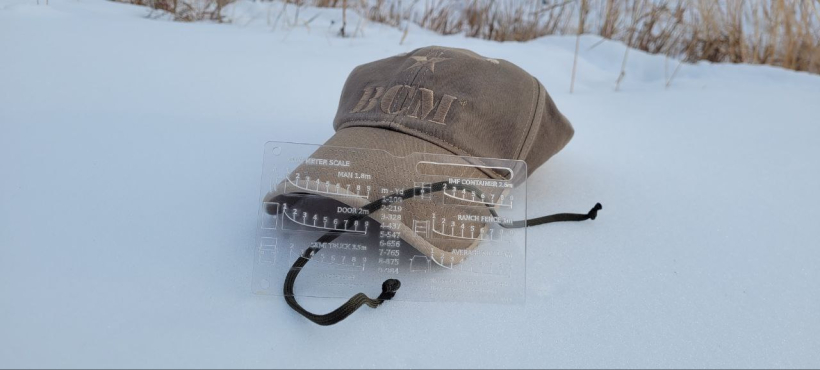 Black HIlls Designs RANGE-R Card next to a Bravo Company Machine hat