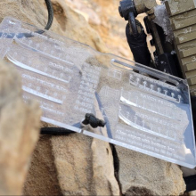 Black HIlls Designs RANGE-R Card close up with an FN SCAR-L Rifle