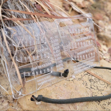 Black HIlls Designs RANGE-R Card close up in the field against a rock